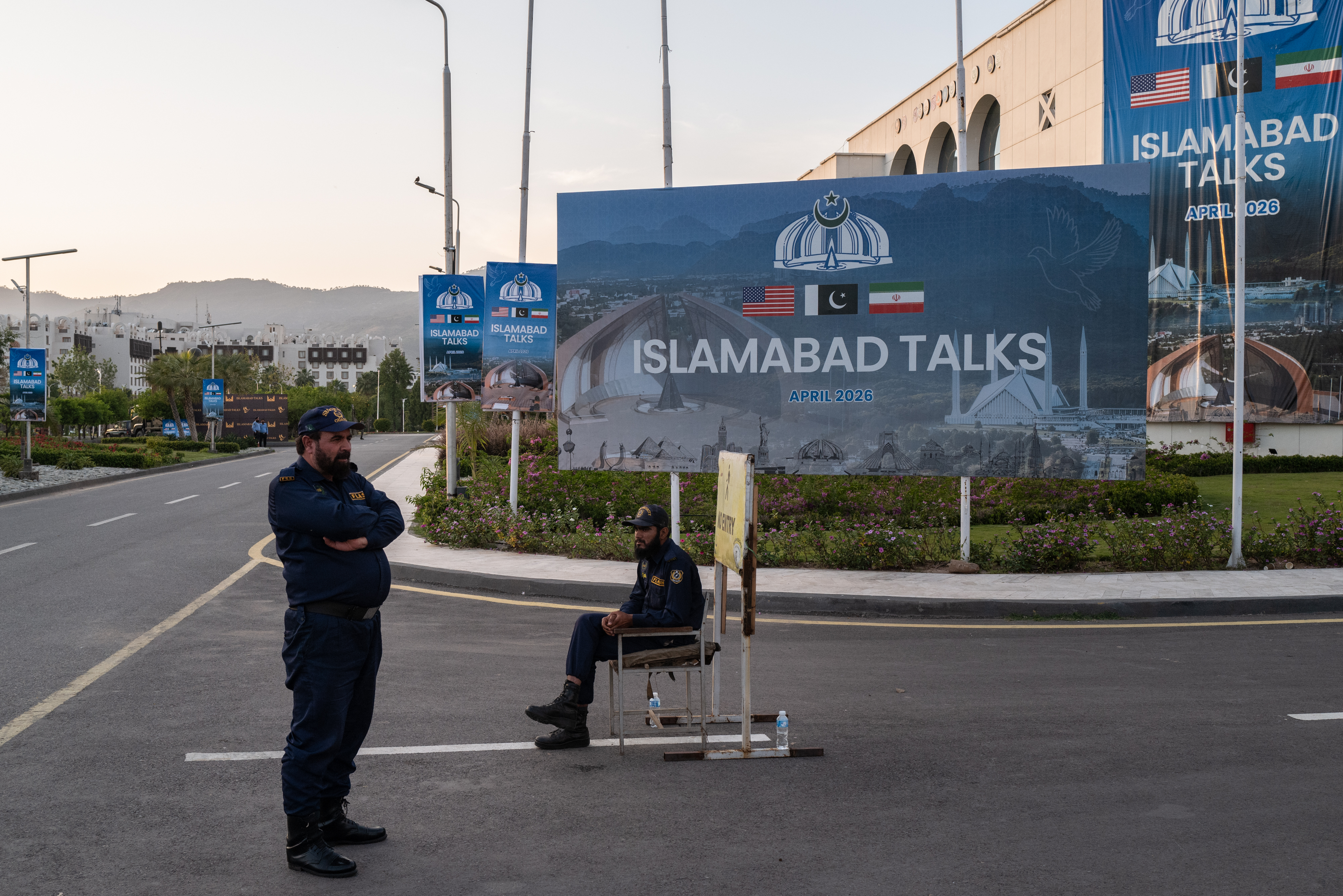 ISLAMABAD, PAKISTAN - APRIL 11: Pakistani security personnel stand guard outside the Jinnah Convention Centre, where international media have gathered to cover talks between U.S and Iranian officials, taking place in the nearby Serena Hotel, on April 11, 2026 in Islamabad, Pakistan. The meeting marks a rare direct engagement between senior U.S. and Iranian officials, as Washington and Tehran seek to advance stalled negotiations over Iran's nuclear programme, with Pakistan serving as neutral ground amid persistent tensions between the two countries. (Photo by Rebecca Conway/Getty Images)