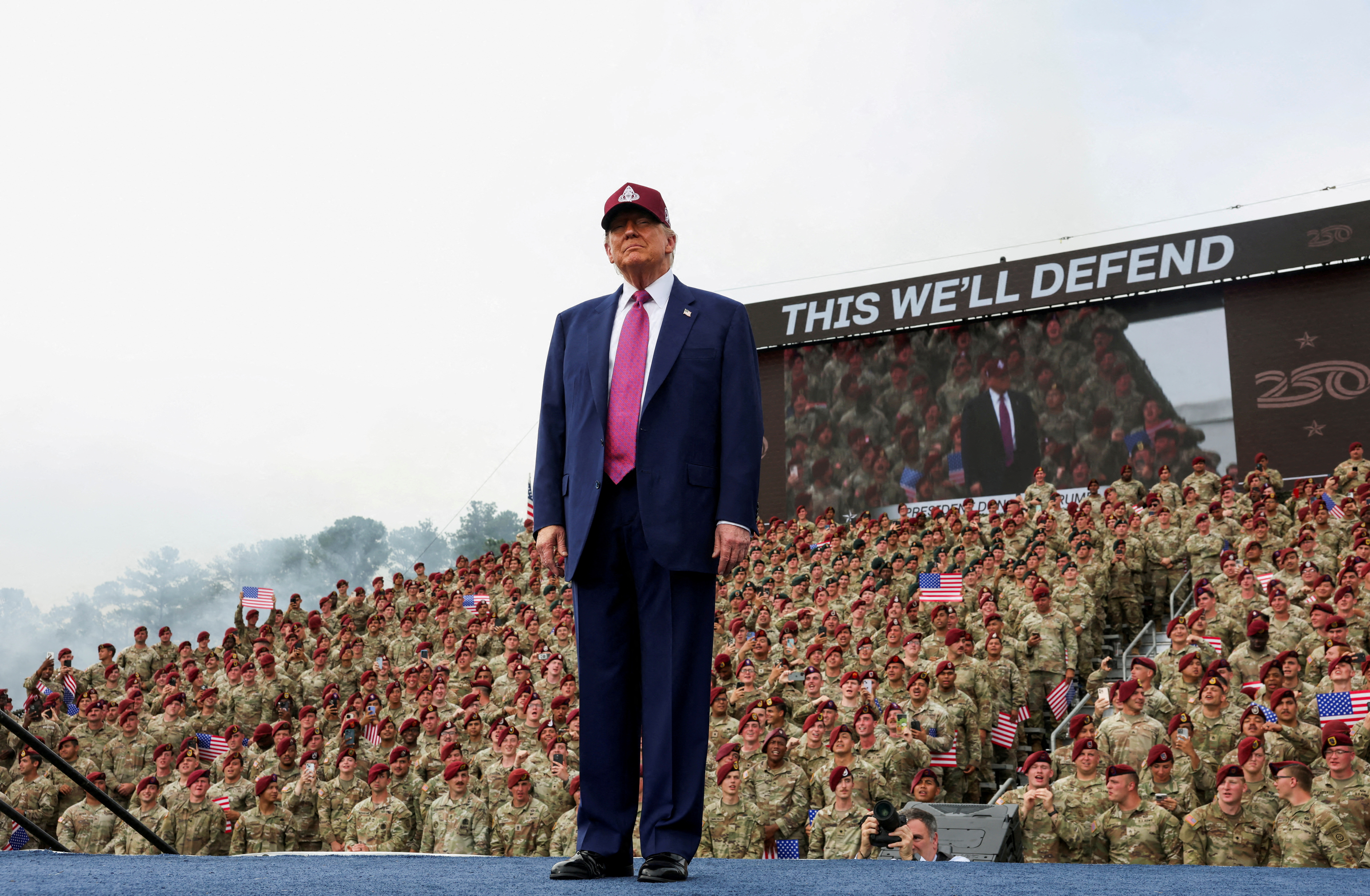 FILE PHOTO: U.S. President Donald Trump stands onstage to deliver remarks during a visit to Fort Bragg to mark the U.S. Army anniversary, in North Carolina, U.S., June 10, 2025. REUTERS/Evelyn Hockstein/File Photo